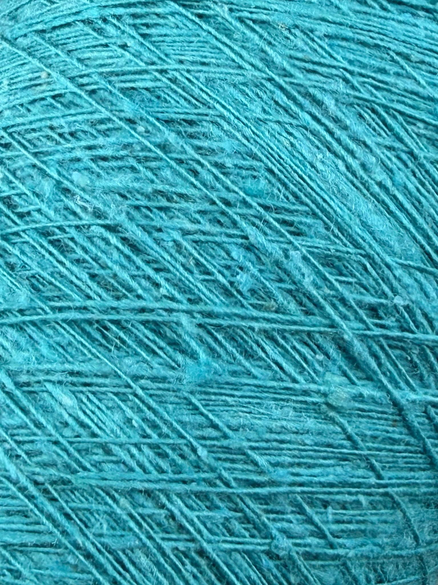 Art. Seta Tweed Bourette – Garn aus 100 % Bouretteseide mit Tweed-Effekt col. Türkis 700 m / 100 g